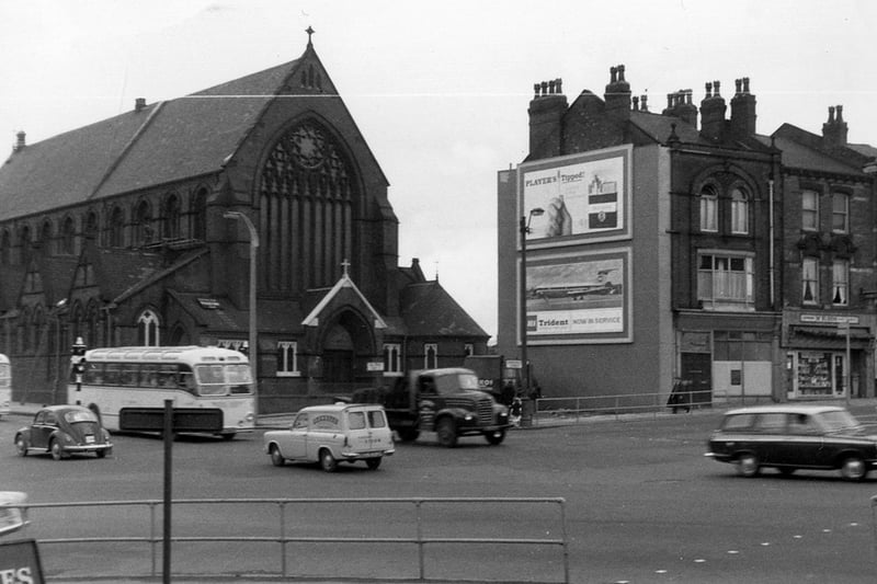 St. Patrick's Roman Catholic Church standing at Woodpecker Junction. The coaches are in New York Road, the properties to the right are in Burmantofts Street. Marsh Lane goes off from the bottom left-hand corner.