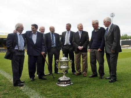 The late Wilf Rosenberg, second left, reunited with former teammates - and the Championship trophy - at Headingley in 2011. Picture by Tony Johnson