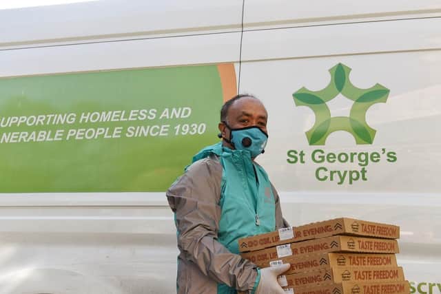 Delivering pizzas to St George's Crypt (photo: Deliveroo).