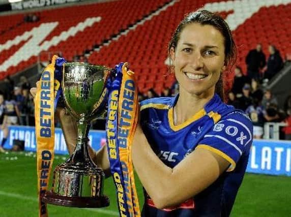Leeds Rhinos captain Courtney Hill with the Betfred Women's Super League trophy. Picture by Steve Riding.