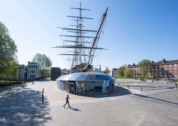 A lone runenr passes the Cutty Sark, normally one of the great London Marathon landmarks.