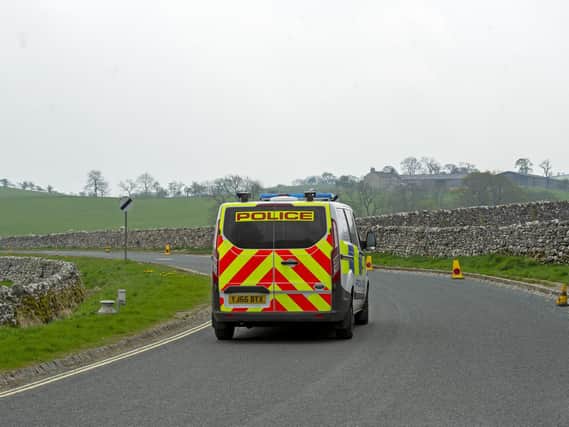 Police patroling the dales around Malham asking visitors to stay away from the area during the coronavirus lockdown. Picture Tony Johnson.