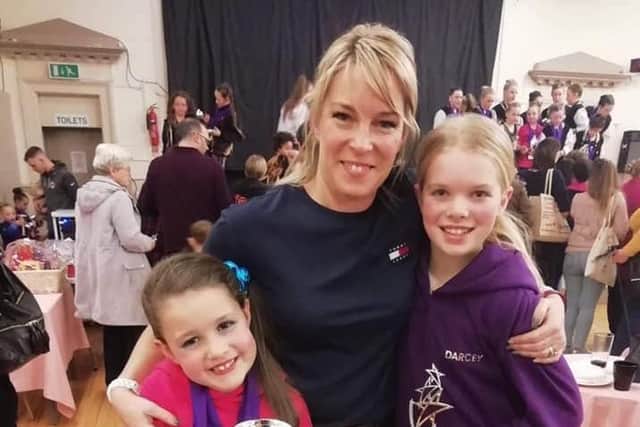 Katie Turner, who runs Katie Louise School of Dance, with two of the pupils who star in the video: Suraya Pickersgill, eight, left, and Darcey Horn, 10.
