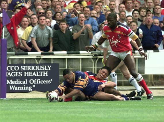 Leroy Rivett scores atr Wembley, watched by London's Martin Offiah. Picture by Bruce Rollinson.