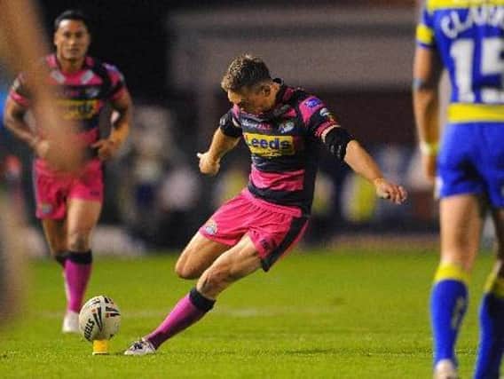 Kevin Sinfield's late penalty senrt Rhinos to Old Trafford in 2011. Picture by PA.