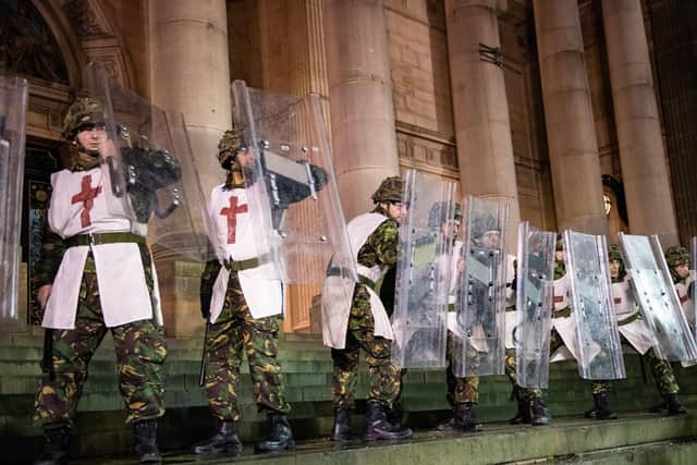 Soldiers at Leeds Town Hall in The Good Book. Picture: Slung Low/Brett Chapman.