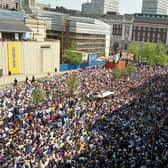 INCREDIBLE: Yorkshire Evening Post photographer Steve Riding captures the stunning scene on the Headrow as an estimated 150,000 Leeds United fans fill the city's streets celebrating the 1992 title triumph. Picture by Steve Riding.