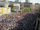 INCREDIBLE: Yorkshire Evening Post photographer Steve Riding captures the stunning scene on the Headrow as an estimated 150,000 Leeds United fans fill the city's streets celebrating the 1992 title triumph. Picture by Steve Riding.