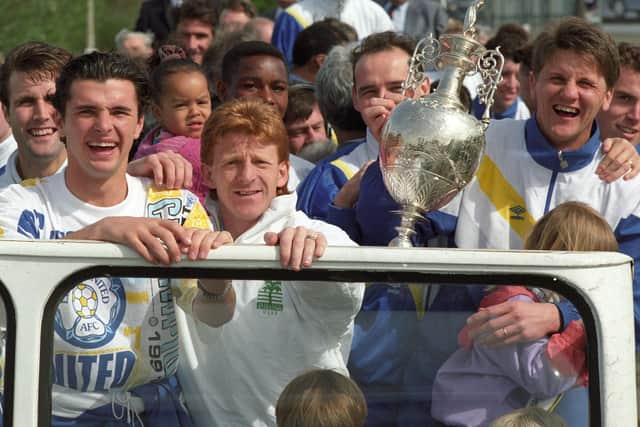 MEMORIES: Mel Sterland, behind the trophy, enjoying Leeds United's 1992 bus parade to celebrate the club's Division One title triumph. Picture by Giles Rocholl.