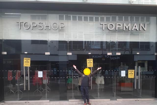 An Extinction Rebellion activist outside Topshop in Briggate (photo: Extinction Rebellion Leeds).