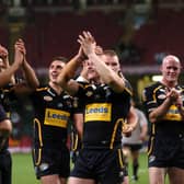 Rhinos players celebrate beating Bradford at the 2007 Magic Weekend. Picture by Steve Riding.