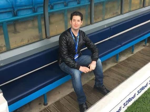 SACRED GROUND: The author pictured at his beloved Elland Road.