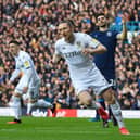 CLOSING IN: Luke Ayling races away to celebrate his strike in Leeds United's most recent game - the 2-0 win at home to Huddersfield Town on March 7. Photo by George Wood/Getty Images.
