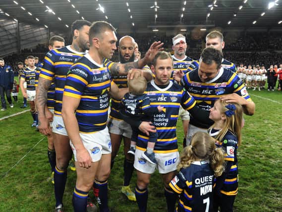 Rob Burrow, centre, after his fund-raising game, which was also Jamie Jones-Buchanan's testimonial, in January. Picture by Steve Riding.