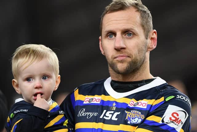 Rob Burrow with his one-year-old son Jackson. Picture by Jonathan Gawthorpe.