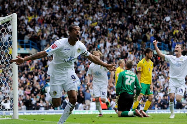GOING UP: Leeds United striker Jermaine Beckford sprints away to celebrate his winning goal against Bristol Rovers as Jonny Howson also shows his delight after previously drawing the Whites level. Photo by Michael Regan/Getty Images.