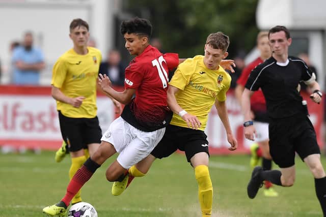 WANTED MAN: Leeds United target and Linfield youngster Charlie Allen, playing for County Antrim in the SuperCupNI Junior section final against Zidane Iqbal of Manchester United. Pic: Getty