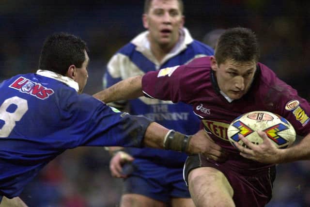 Brett Mullins scores for Rhinos during their record 106-10 win at Swinton Lions in 2001. Picture by Mark Bickerdike.