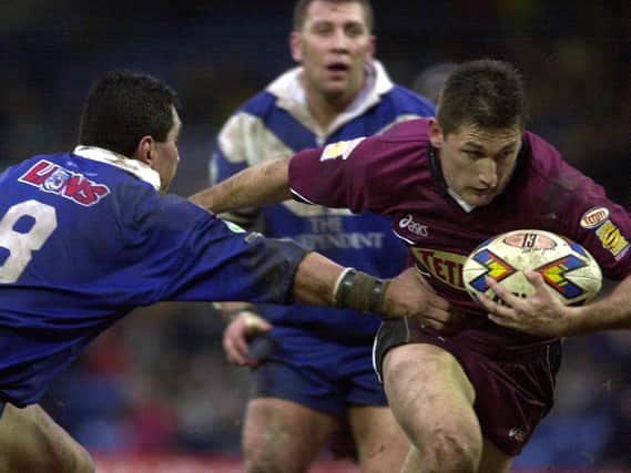 Brett Mullins scores for Rhinos during their record 106-10 win at Swinton Lions in 2001. Picture by Mark Bickerdike.