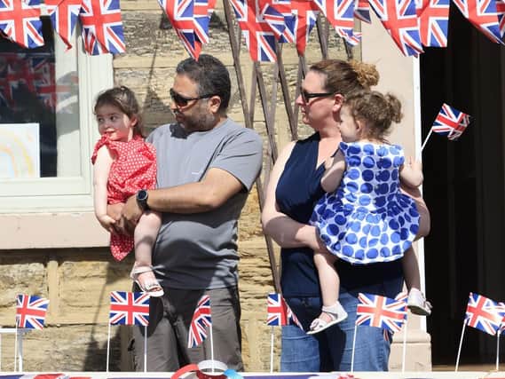 A family mark the 75th anniversary of VE Day in Thorner. Pic: Danny Lawson/PA