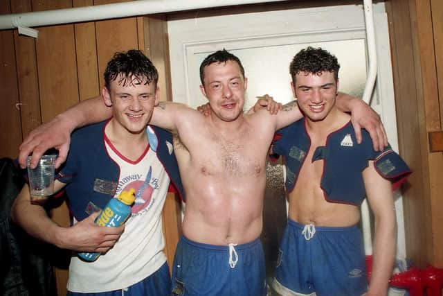 Francis Cummins with Garry Schofield, centre and Graham Holroyd, right in the Central Park, Wigan, changing rooms following Leeds' semi-final success 26 years ago. Picture by Steve Riding.