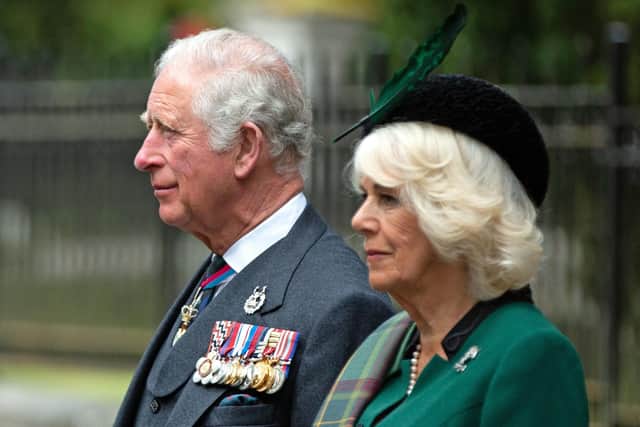 The Prince of Wales and Duchess of Cornwall led the two minutes silence to mark VE Day.
