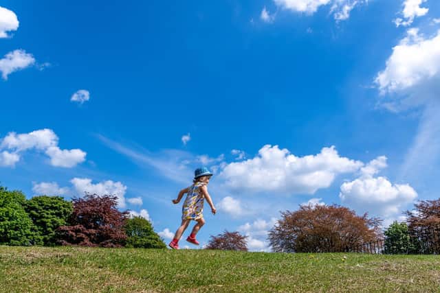 A little girl enjoying a park in Leeds at the weekend.