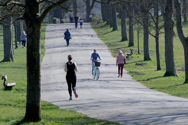 People enjoying their daily exercise in Roundhay Park before the latest announcement from the Prime Minister. JPIMedia.