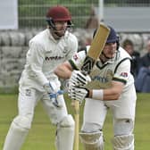 New Farnley v Woodlands Bradford League  Priestley Cup Final at Undercliffe sun 11th aug 2019Opener Adam Waite hits runs  in his innings of 97 not out for New Farnley, watched by Woodlands wicket keeper Greg Finn