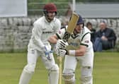 New Farnley v Woodlands Bradford League  Priestley Cup Final at Undercliffe sun 11th aug 2019Opener Adam Waite hits runs  in his innings of 97 not out for New Farnley, watched by Woodlands wicket keeper Greg Finn