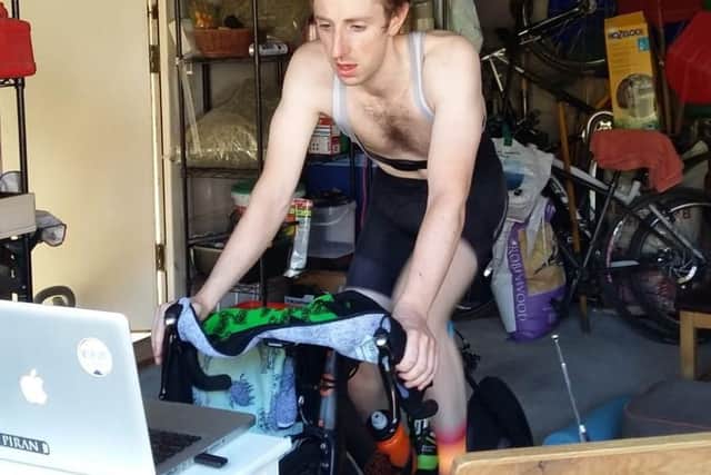 Rob Duckworth during his cycle of Everest - in his garage.