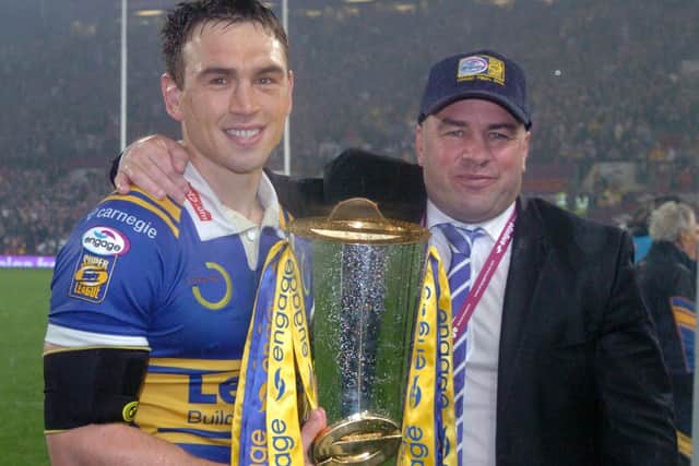 Leeds Rhinos won the Super League title from fifth place in the table in 2008. 
Kevin Sinfield and Brian McClennan show off the trophy. Picture: Steve Riding.