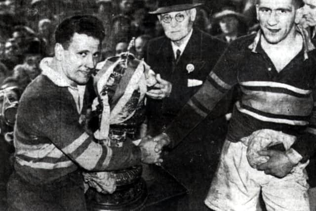Leeds captain Vic Hey, left, with Hunslet skipper Jack Walkington after the 1938 Championship final at Elland Road, which the Parksiders won.