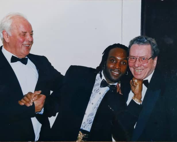 John Morgan (right) pictured with Leeds United legend John Charles and boxer Nigel Benn.