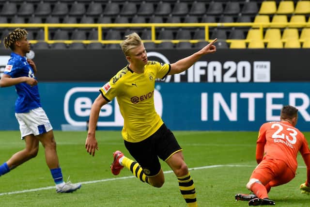 GOLDEN BOY - Erling Haaland of Borussia Dortmund celebrates scoring his team's first goal during the Bundesliga match between Borussia Dortmund and FC Schalke 04 at Signal Iduna Park. Pic: Getty