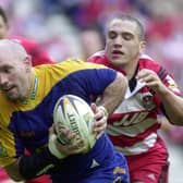 Adrian Vowles goes over for his late try for Leeds against Wigan on this day in 2002. Picture: Steve Riding.