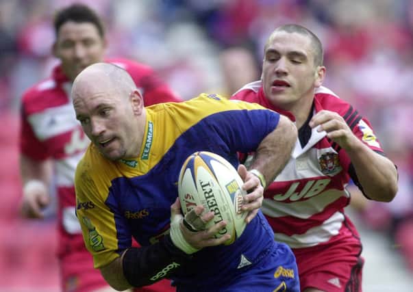 Adrian Vowles goes over for his late try for Leeds against Wigan on this day in 2002. Picture: Steve Riding.