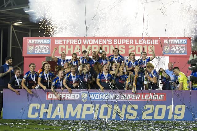 Rhinos women celebrate their Grand Final triumph. Picture by (Isabel Pearce SWpix.com
