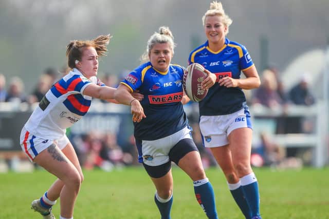 Aimee Staveley on the charge for Rhinos agianst Wakefield Trinity. Picture by Alex Whitehead/SWpix.com.