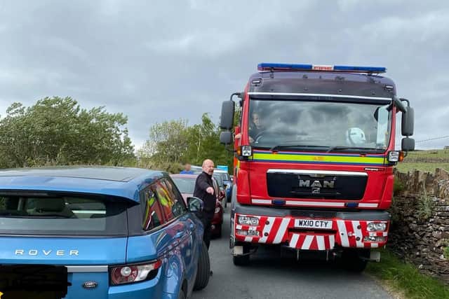 It was a very tight squeeze for the fire engine due to the number of parked cars on the road. Photo: WYFRS