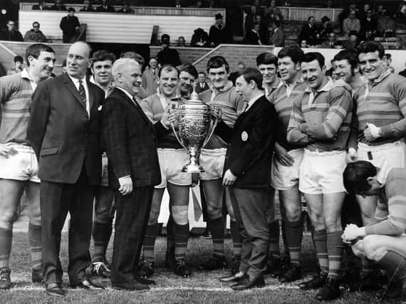Leeds captain Barry Seabourne is presented with the Yorkshire League trophy for 1968-69. Pixture by YPN.