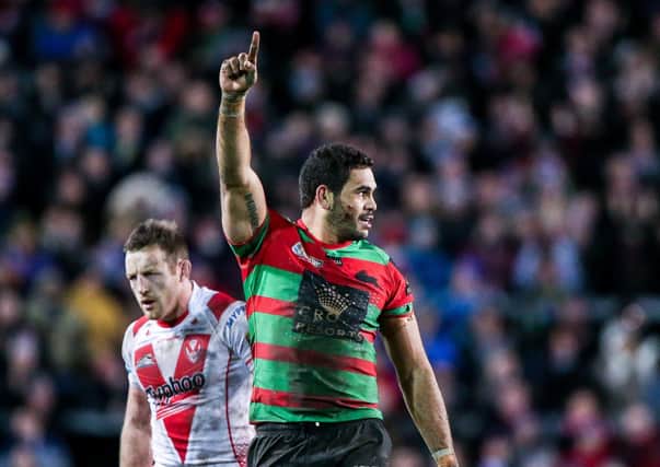 INCOMING: Greg Inglis celebrates the World Club Challenge win for South Sydney Rabbitohs against St Helens at Langtree Park in February 2015. Picture by Alex Whitehead/SWpix.com