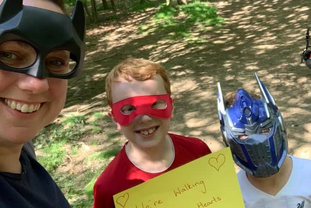 Hannah Saven, a sister on the congenital heart unit at Leeds General Infirmary, with her children Freddie and Oscar, taking part in the #LeedsHearts challenge.