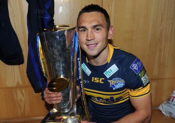 Kevin Sinfield with the Super League Trophy after the Grand Final victory over Warrington in 2012. Picture: Steve Riding.