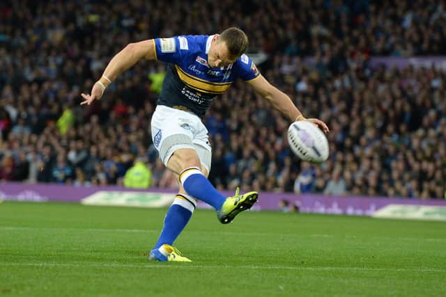 Kevin Sinfield kicks a conversion during the 2015 Grand Final. Picture: Anna Gowthorpe/PA Wire.