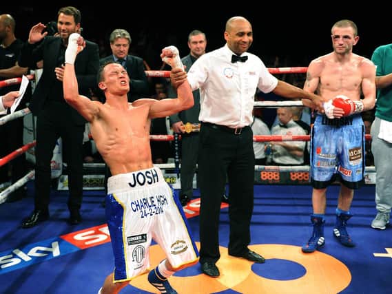 FEELING CHAMPION: Josh Warrington is declared the victor in his British title bout against Martin Lindsay. Picture: Jonathan Gawthorpe.