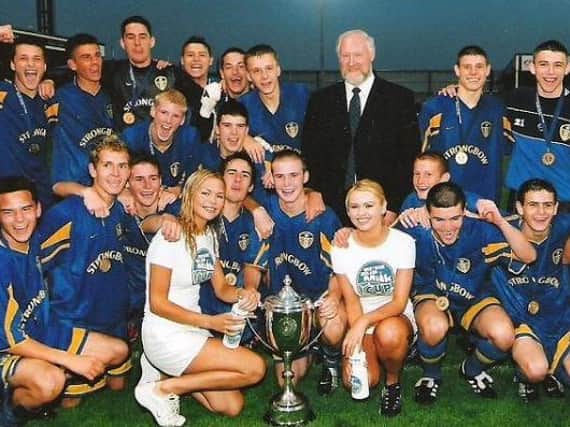 CHAMPIONS - Leeds United Under 16s, featuring Henry McStay, centre with cup, and James Milner, back second from right, won the Milk Cup's Premier Section in 2002. Pic: SuperCupNI
