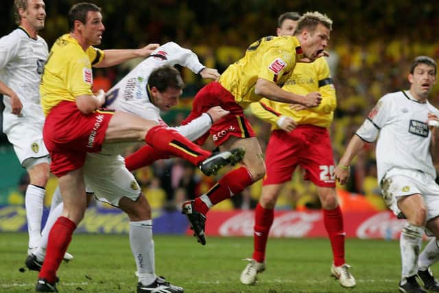 SET PIECE STING: Watford's Jay Demerit escapes his marker Rob Hulse, far left, to head his side in front during the Coca-Cola Championship play-off final against Leeds United at the Millennium Stadium on May 21, 2006. Photo by Stu Forster/Getty Images.