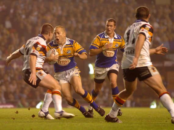Andrew Dunemann takes on Iestyn Harris during the 2005 Super League Grand Final. Picture by Steve Riding.