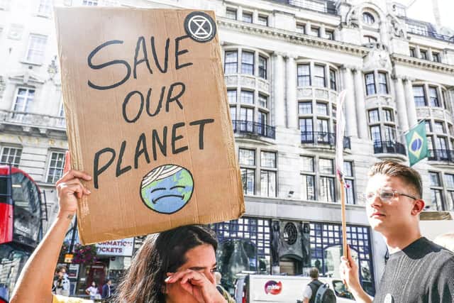 Pictured, Extinction Rebellion activists protest outside Brazilian embassy in London, last years, to highlight the devastating fire which are taking place in the Amazon rainforest. Photo credit: Adam Gray / SWNS